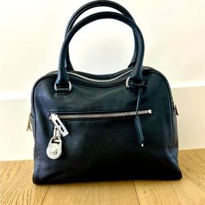 Michael Kors black leather handbag.